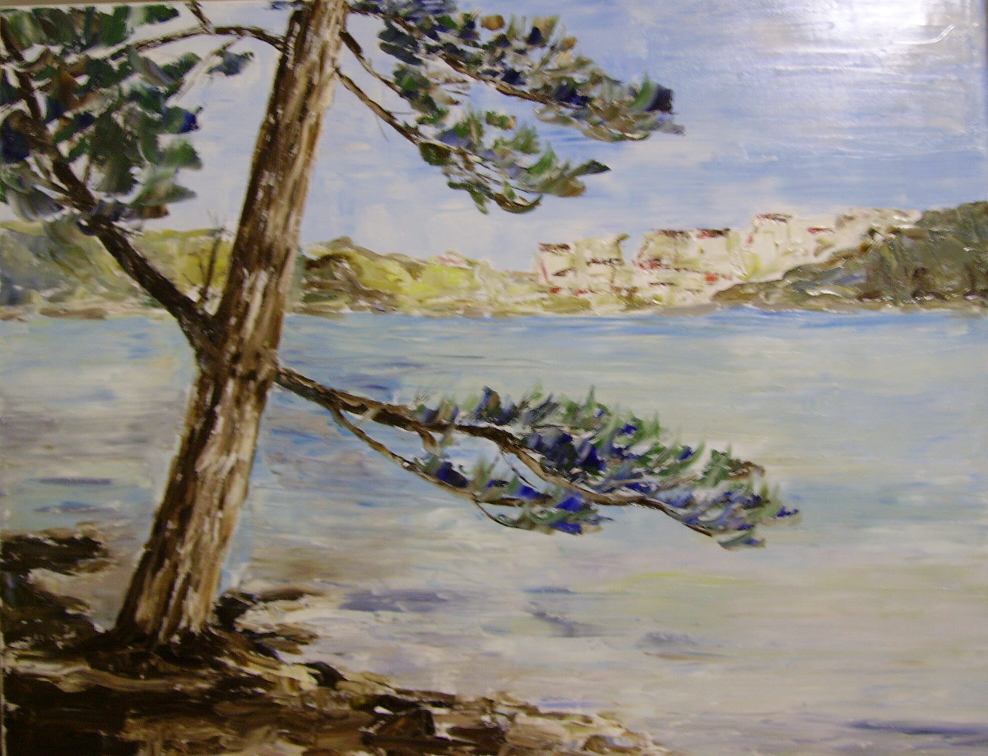 Painting of a tree beside calm water with a distant settlement across the bay.